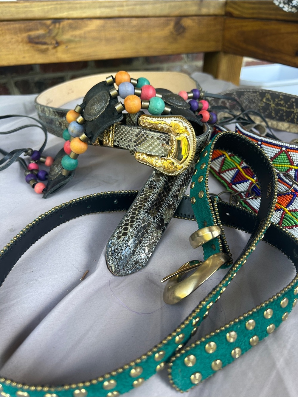 Vintage belt bundle of 4 colorful western belts